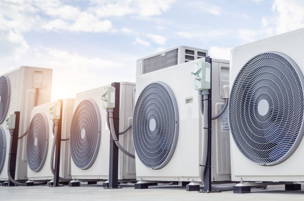multiple HVAC systems at Puyallup, WA on a rooftop, highlighting CT SEO Pro for local rankings